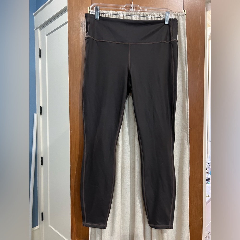 Athleta Women’s Leggings in coated brown color - size large